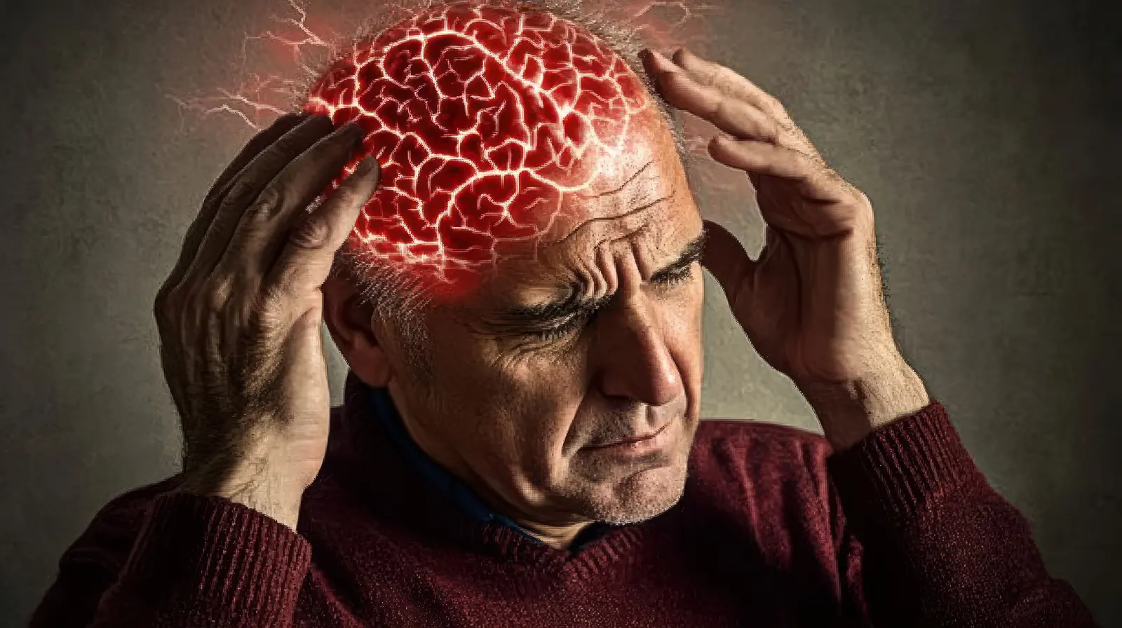 a man facing brain problems as headache and holding his head